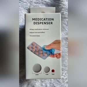 Medication Dispenser with Blue Cap
